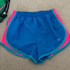 Blue and pink nike shorts
